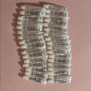 Very large pack of clear lipglosses